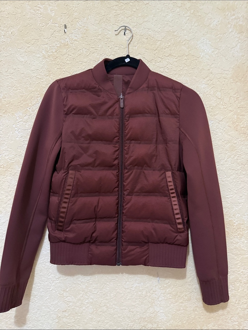 Reversible Lululemon jacket size 2 burgundy with logo on both sides.
